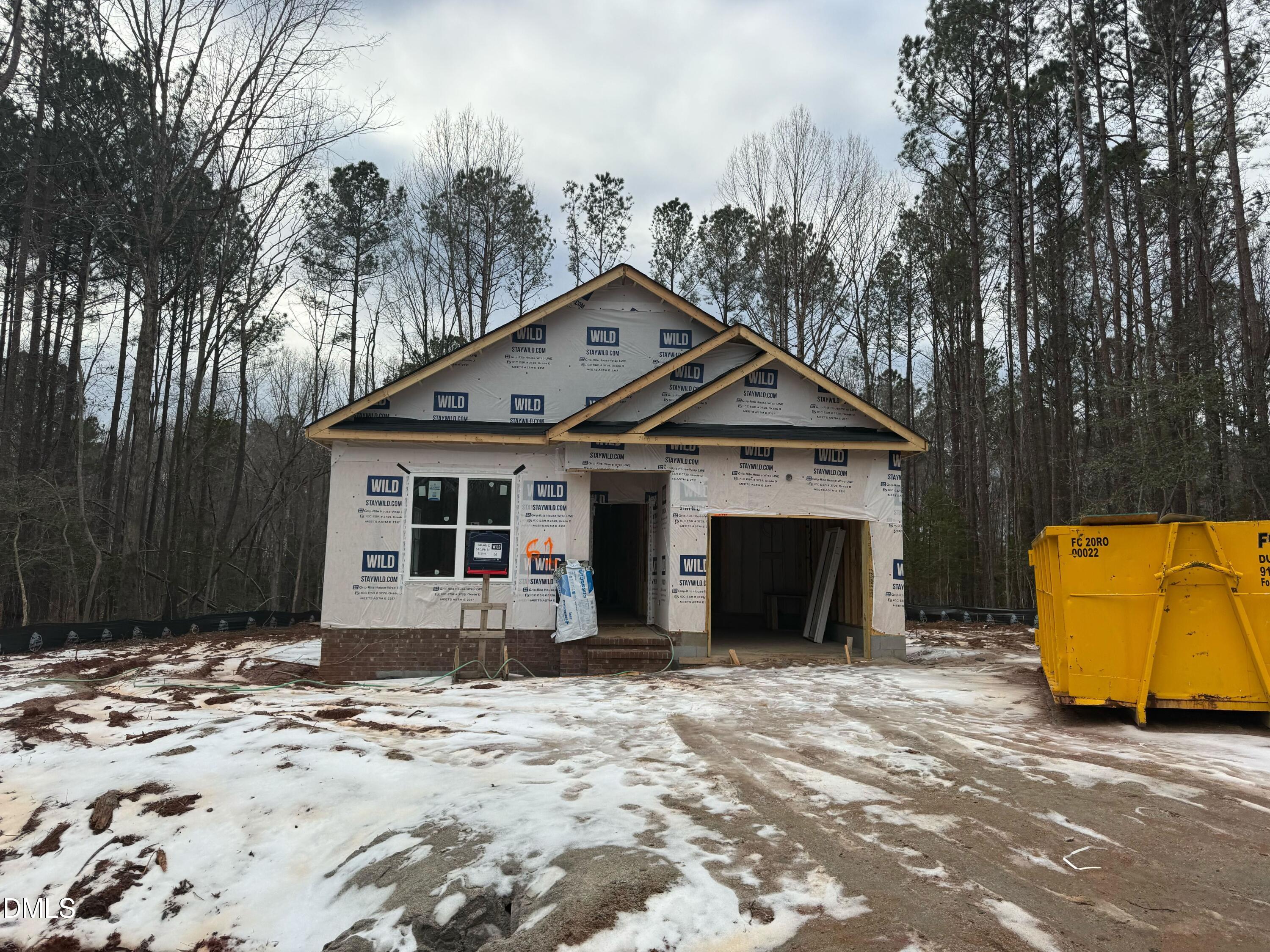 54 Cupid Court Middlesex, NC 27557 - Photo 2 of 7 a front view of a house with a yard