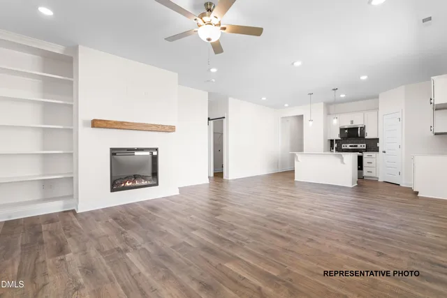a view of a kitchen with furniture and a fireplace