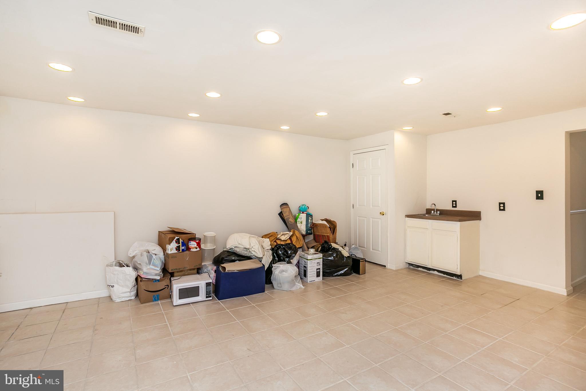 615 Nollmeyer Road Baltimore, MD 21220 - Photo 45 of 46 a living room with furniture and a table