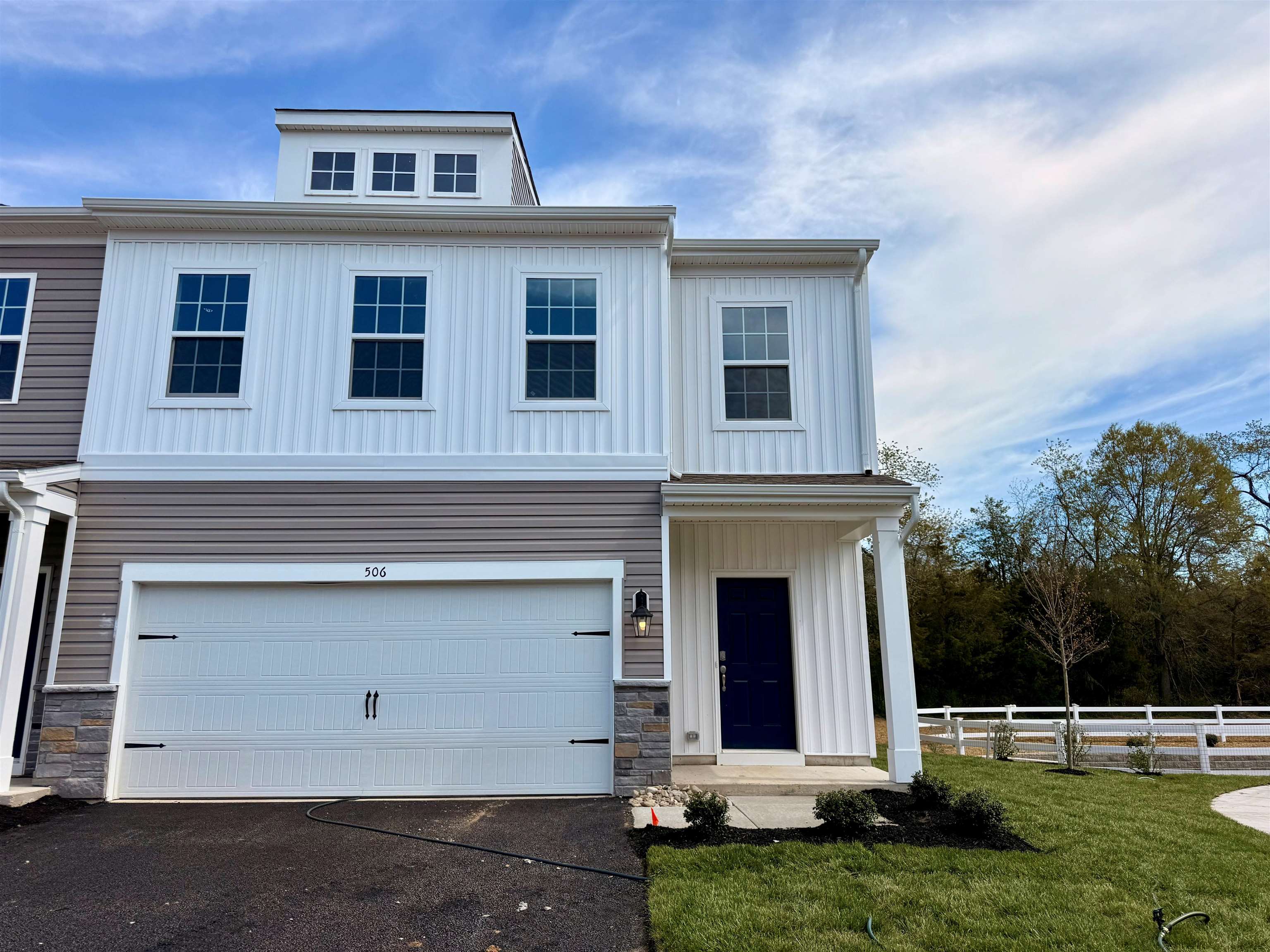 506 Scotty, Unit 1204 Rio Grande, NJ 08242 - Photo 2 of 44 front view of house with a yard