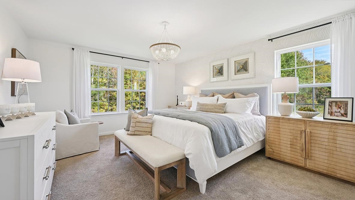 506 Scotty, Unit 1204 Rio Grande, NJ 08242 - Photo 40 of 44 a spacious bedroom with a bed and a large window