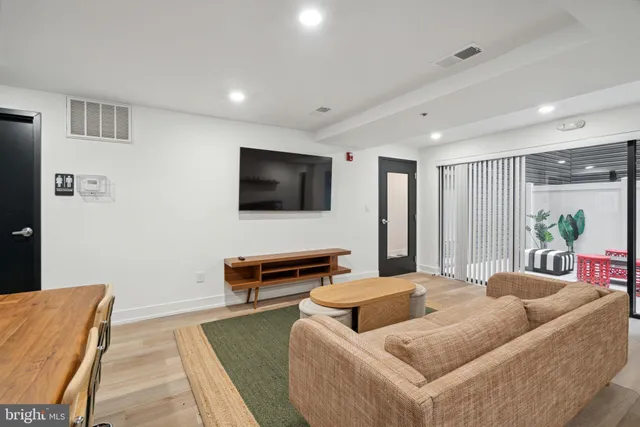 a front view of a building with a glass windows