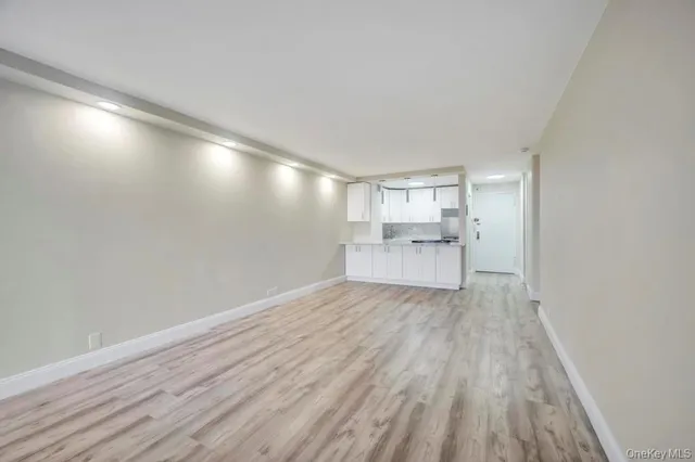 a view of a livingroom with wooden floor