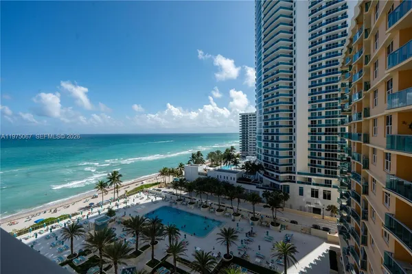 a view of a city with tall buildings