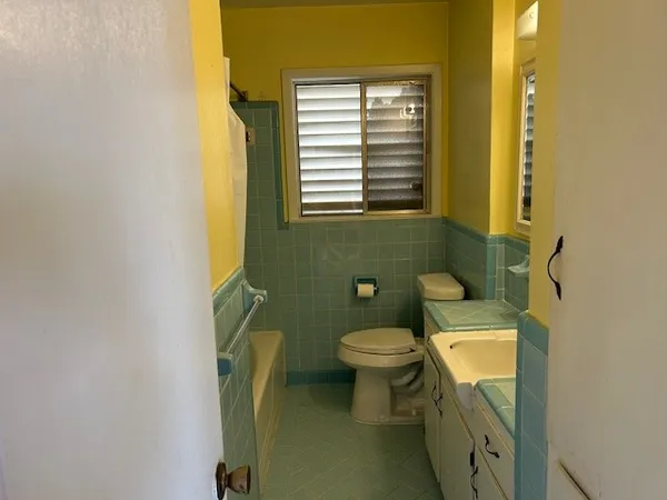 a bathroom with a sink and a toilet