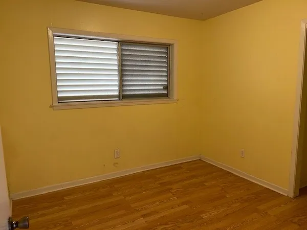 a view of a room that has a window in it