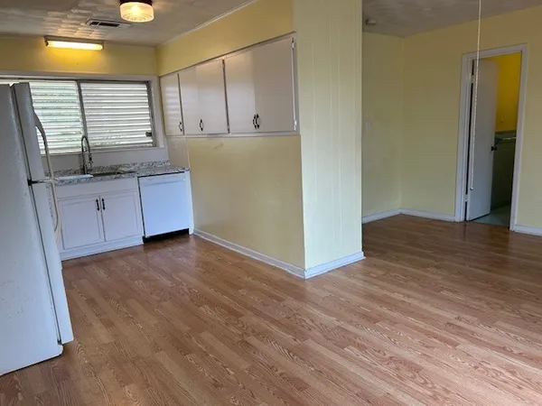 a view of kitchen with wooden floor
