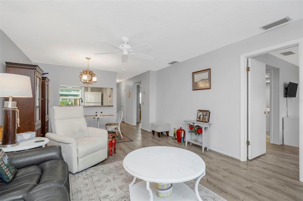 9617 Brassie Court New Port Richey, FL 34655 - Photo 14 of 41 a living room with furniture and a wooden floor
