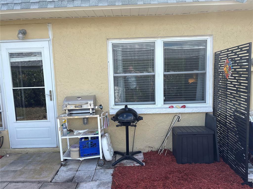 9617 Brassie Court New Port Richey, FL 34655 - Photo 31 of 41 a room with furniture and window