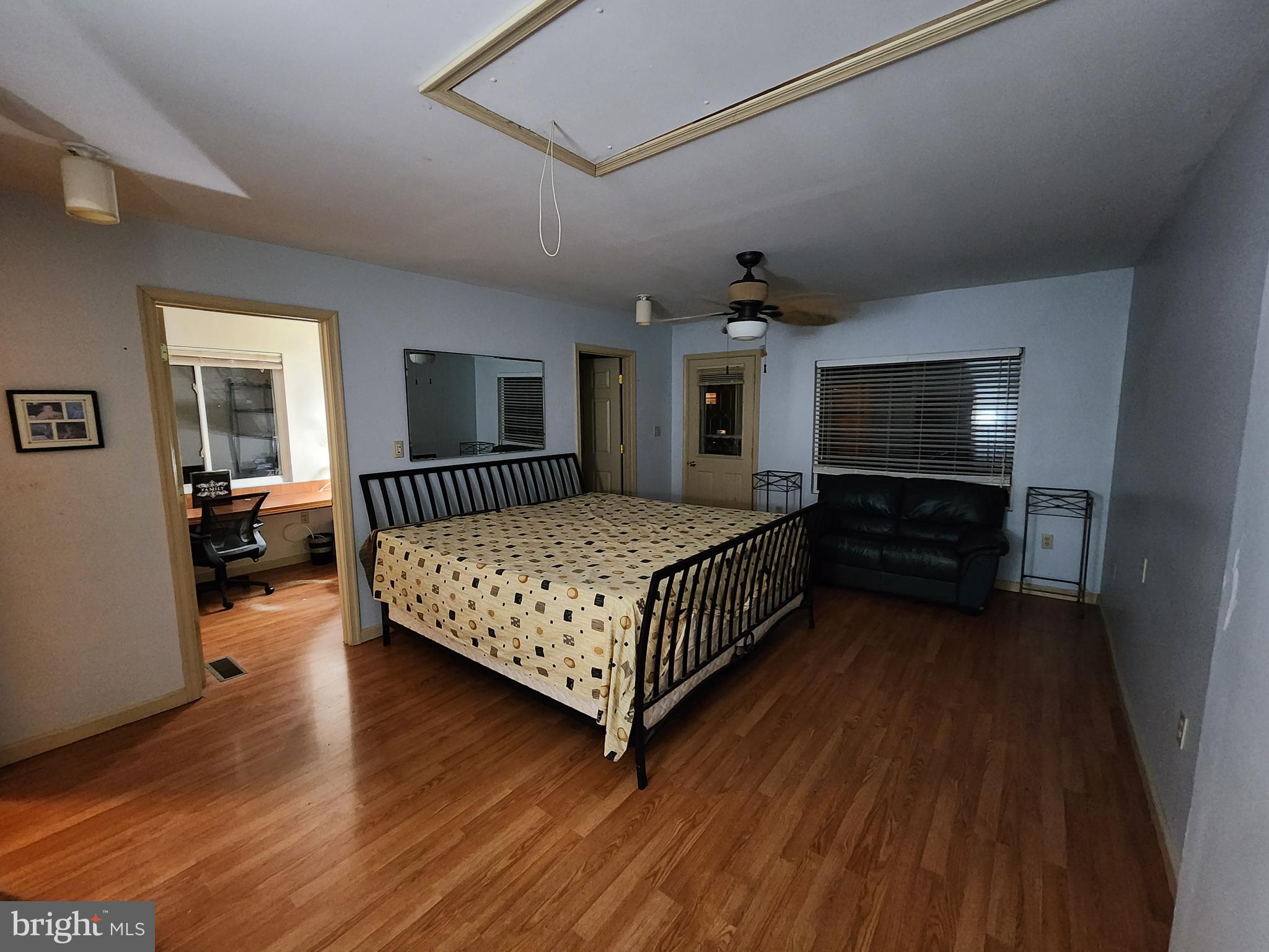 22 Theodore Avenue Maple Shade, NJ 08052 - Photo 12 of 33 a bedroom with a bed window and a flat screen tv