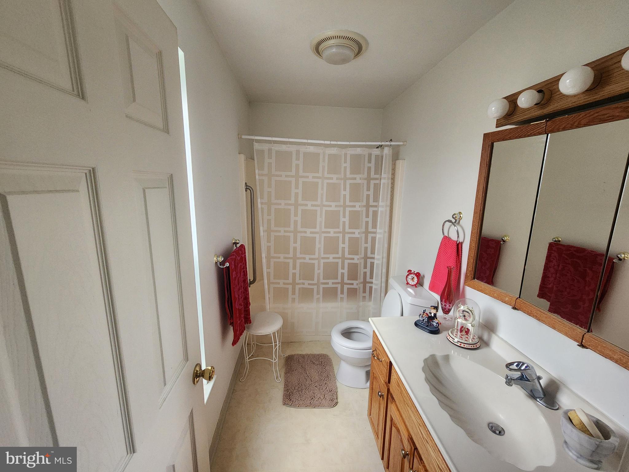 22 Theodore Avenue Maple Shade, NJ 08052 - Photo 4 of 33 a bathroom with a sink vanity granite and toilet
