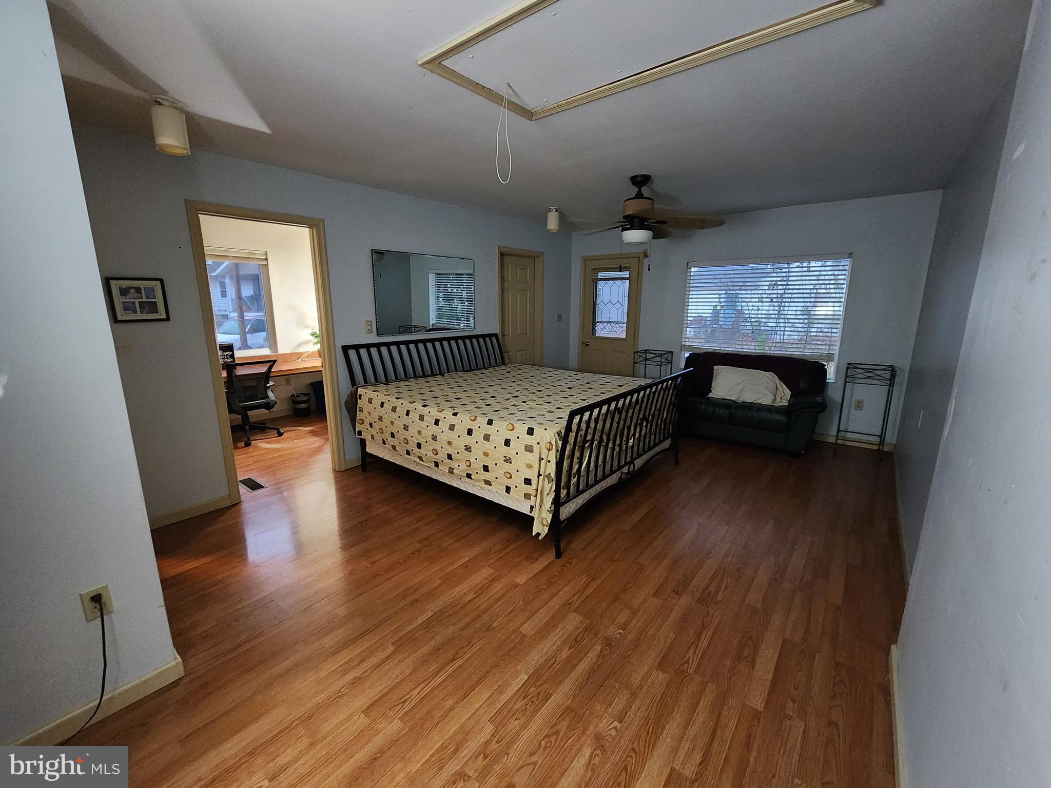 22 Theodore Avenue Maple Shade, NJ 08052 - Photo 9 of 33 a bedroom with a bed and wooden floor