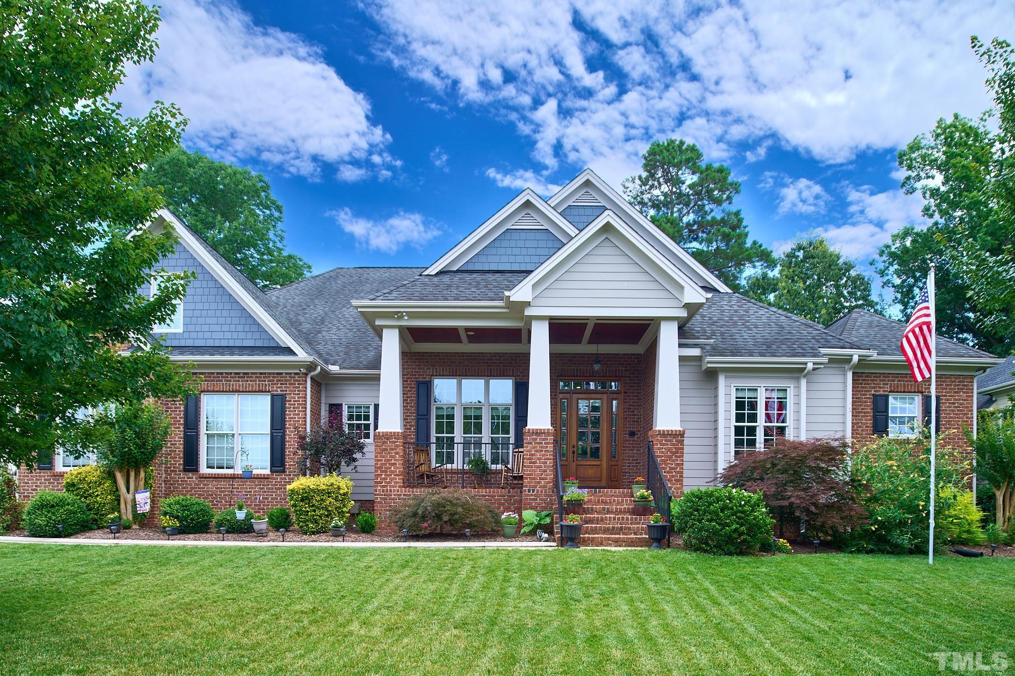 424 Waterville Street Raleigh, NC 27603 - Photo 1 of 76 a front view of a house with a yard