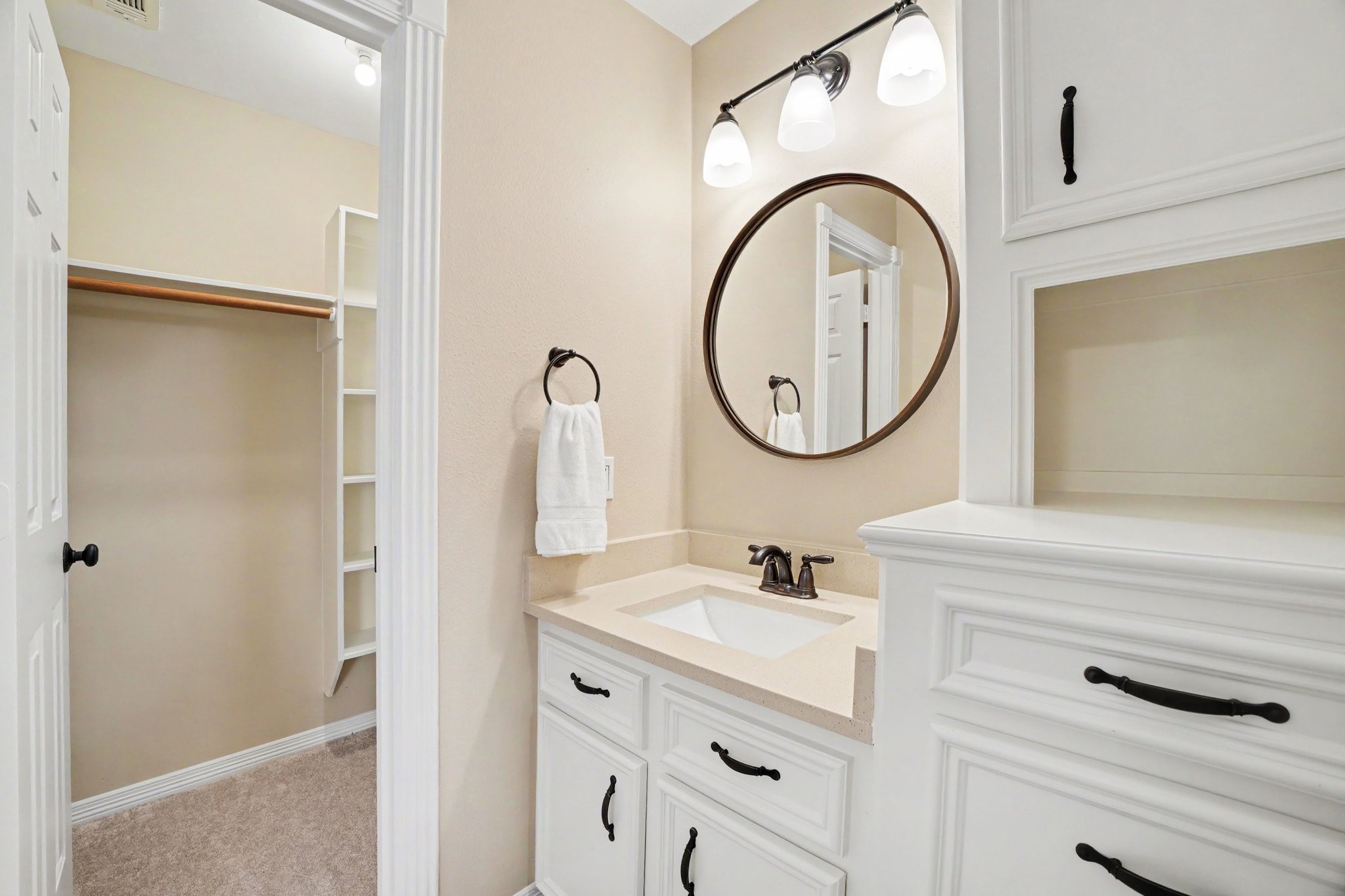 3411 Fir Forest Drive Spring, TX 77388 - Photo 30 of 39 A view of secondary bedroom 2's updated sink area and large walk-in closet.
