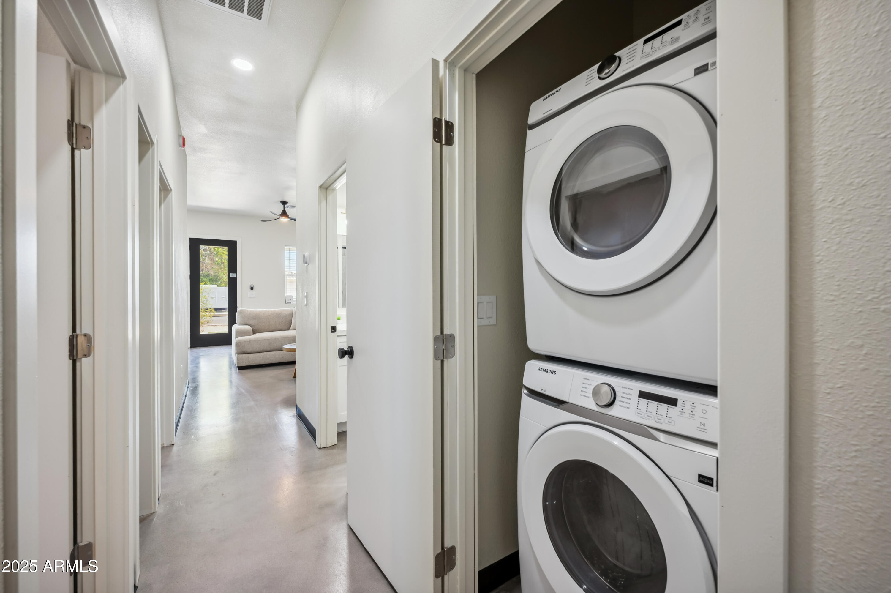 4132 North 11th Street Phoenix, AZ 85014 - Photo 21 of 33 a view of a hallway with washer and dryer
