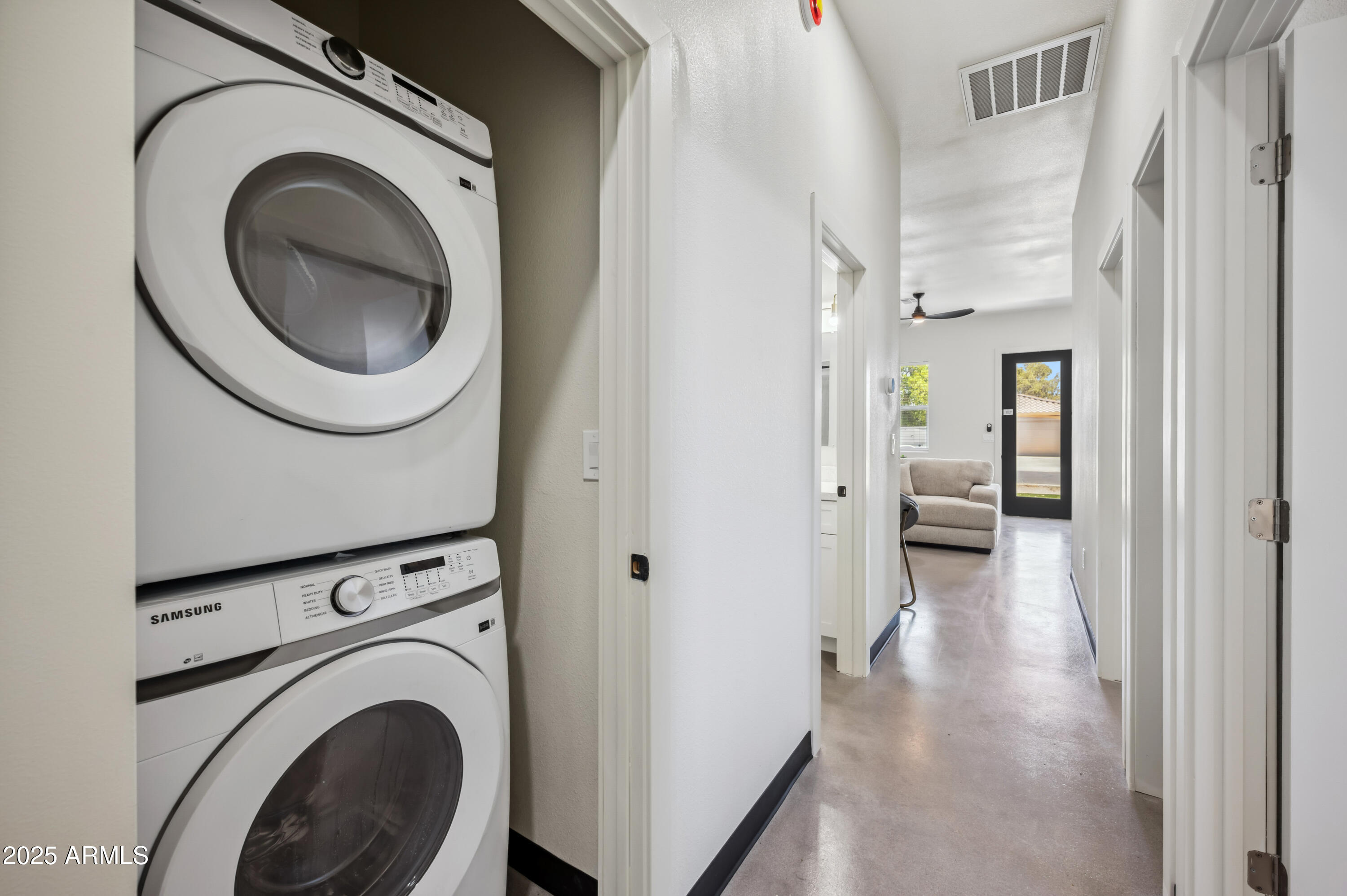 4132 North 11th Street Phoenix, AZ 85014 - Photo 24 of 33 a view of a hallway with washer and dryer