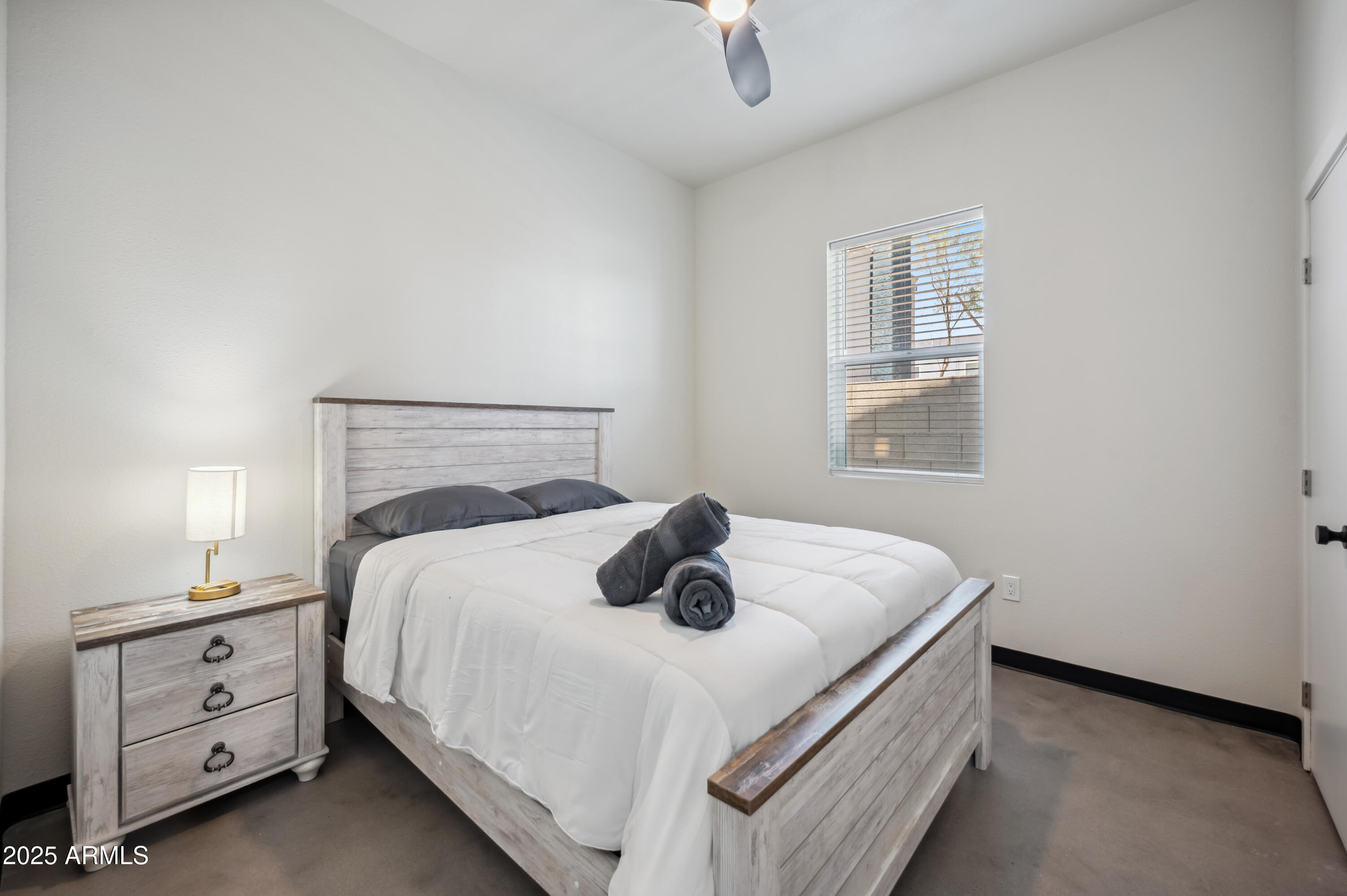 4132 North 11th Street Phoenix, AZ 85014 - Photo 33 of 33 a bedroom with a bed and a window