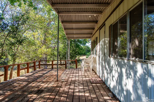 a view of a chairs and tables in the patio