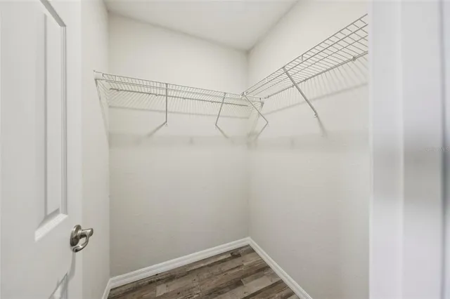 a view of a room with racks on the wall