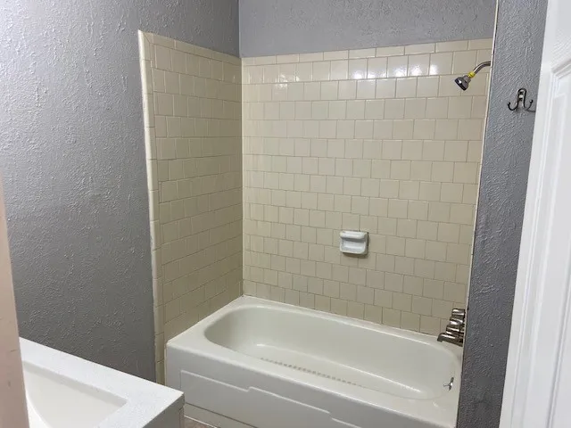 a bathroom with a bathtub