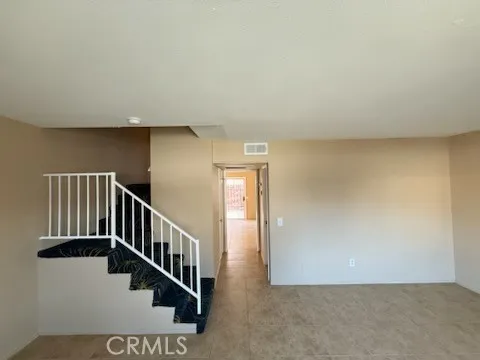 a view of an entryway with stairs