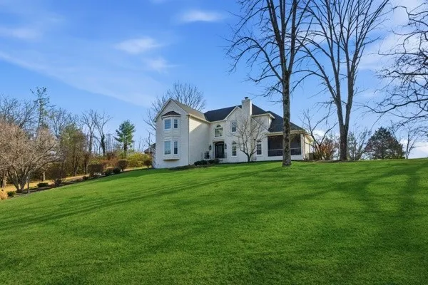 a view of a house with a big yard
