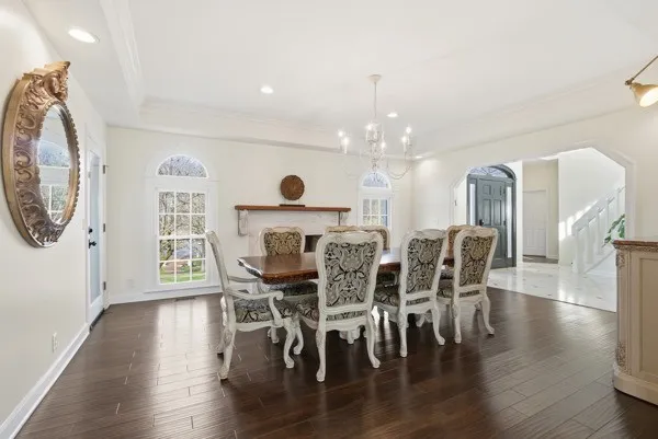 a bed room with a bed and a mirror