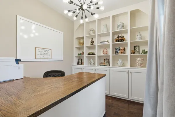 a view of balcony with wooden floor and fence