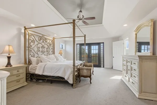 a white bath tub sitting next to a window