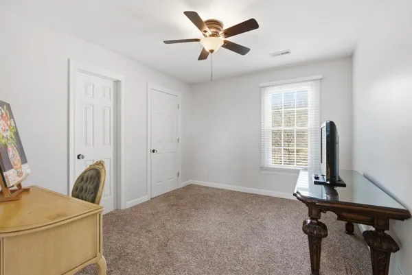 a view of a garden with an outdoor space