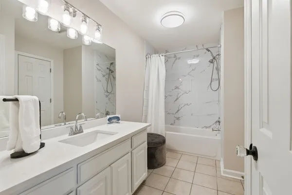 a large house with a big yard and large trees