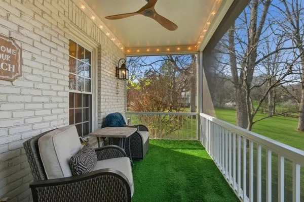 an aerial view of residential house with outdoor space and trees