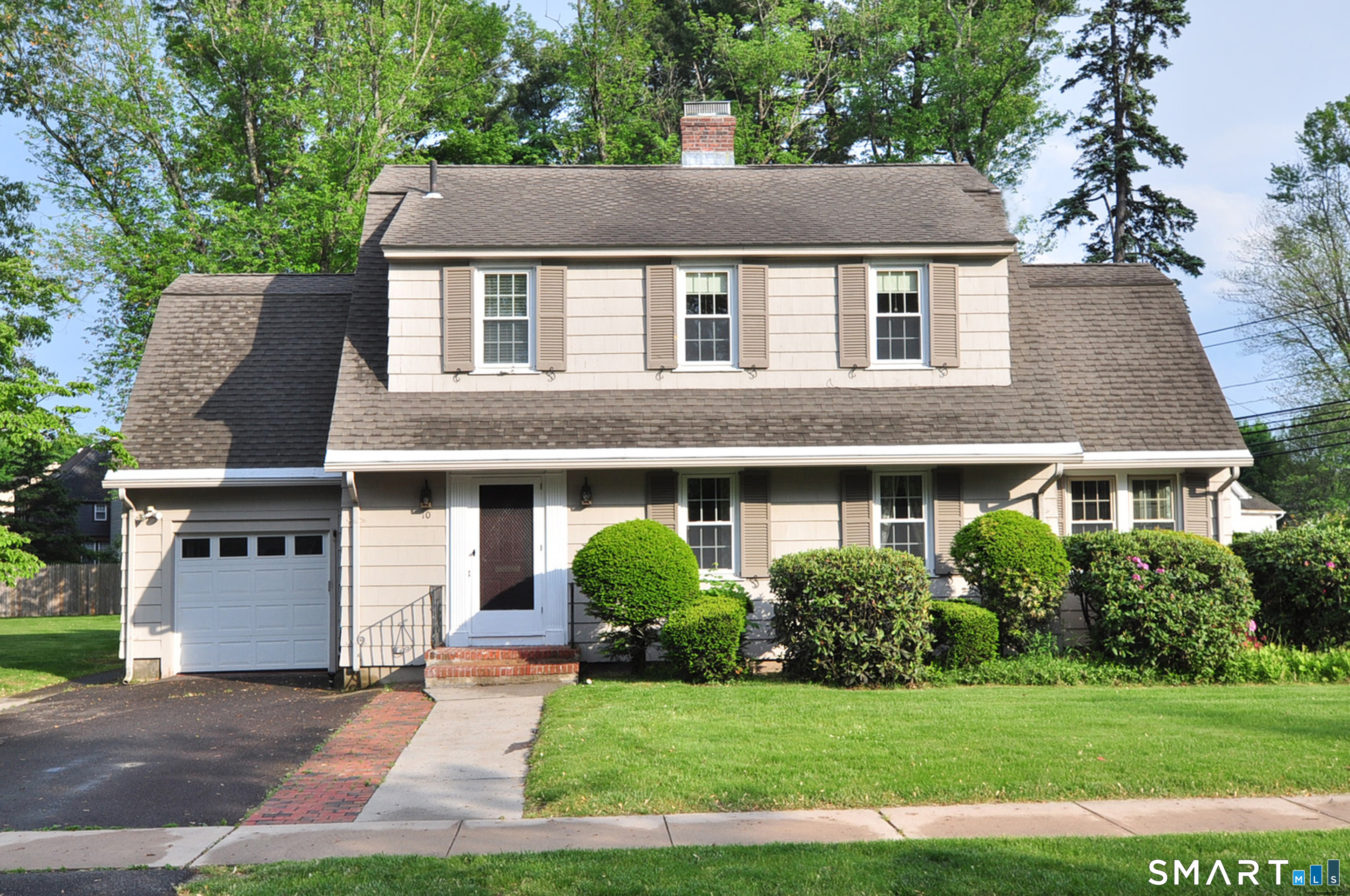 10 Harvey Road Windsor, CT 06095 - Photo 1 of 36 a view of a yard in front of house