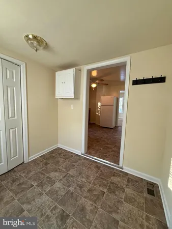 an empty room with closet