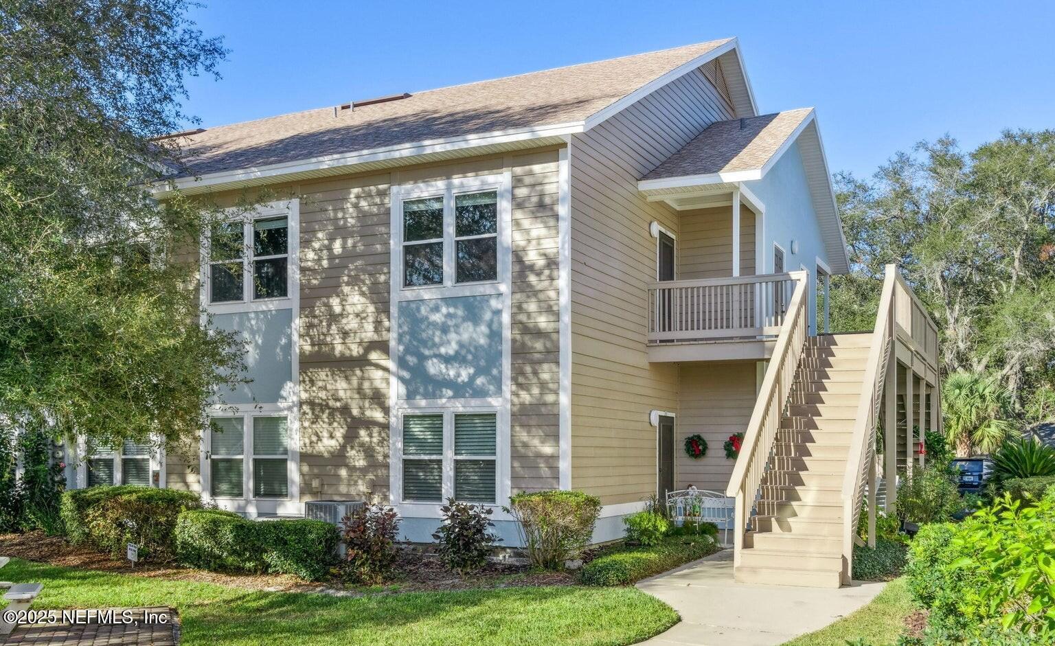 1601 Nectarine Street, Unit F6 Fernandina Beach, FL 32034 - Photo 1 of 57 front view of a house with a yard
