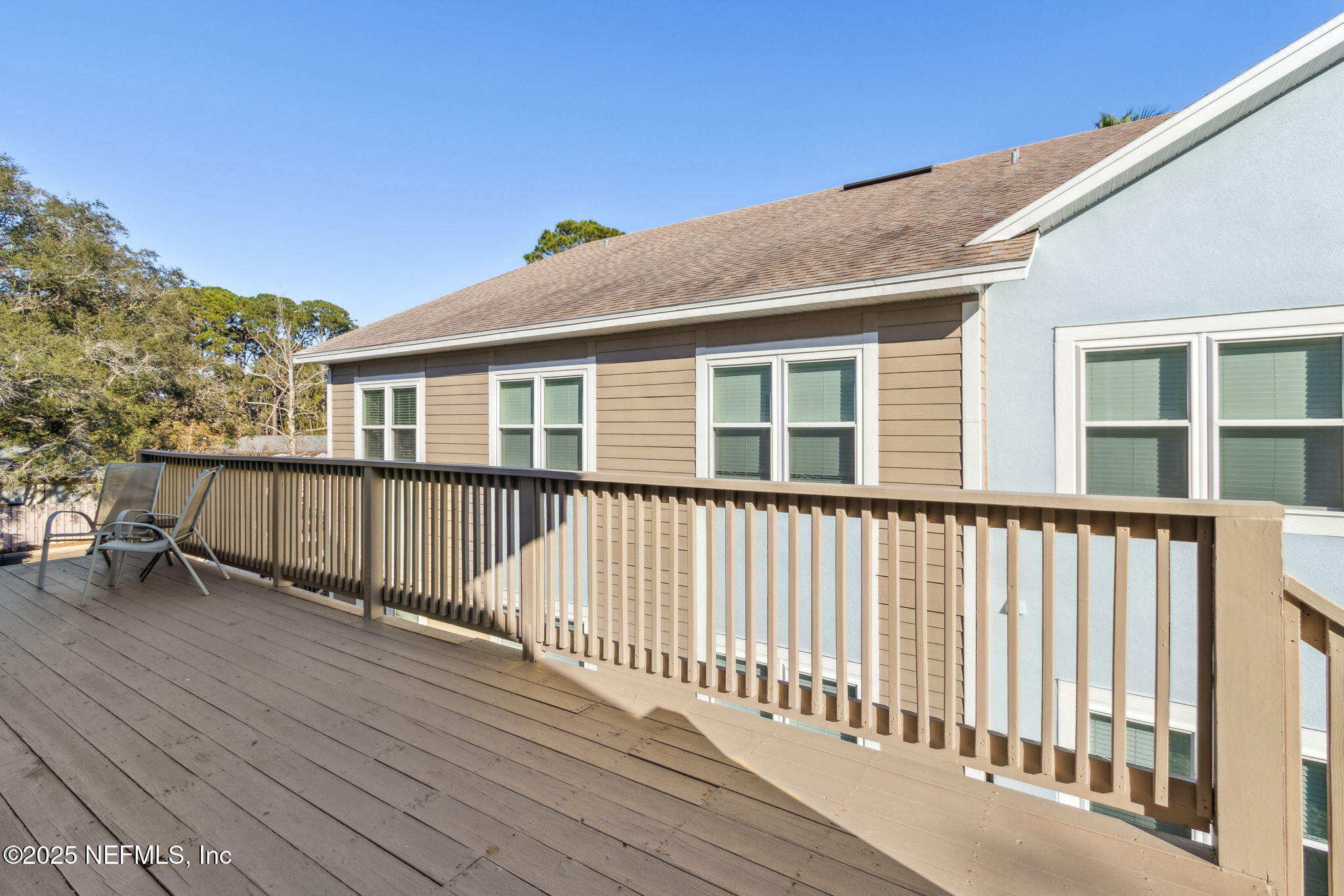 1601 Nectarine Street, Unit F6 Fernandina Beach, FL 32034 - Photo 3 of 57 a front view of a house with a balcony