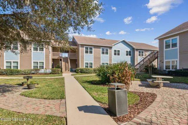 a view of a swimming pool with a lounge chairs