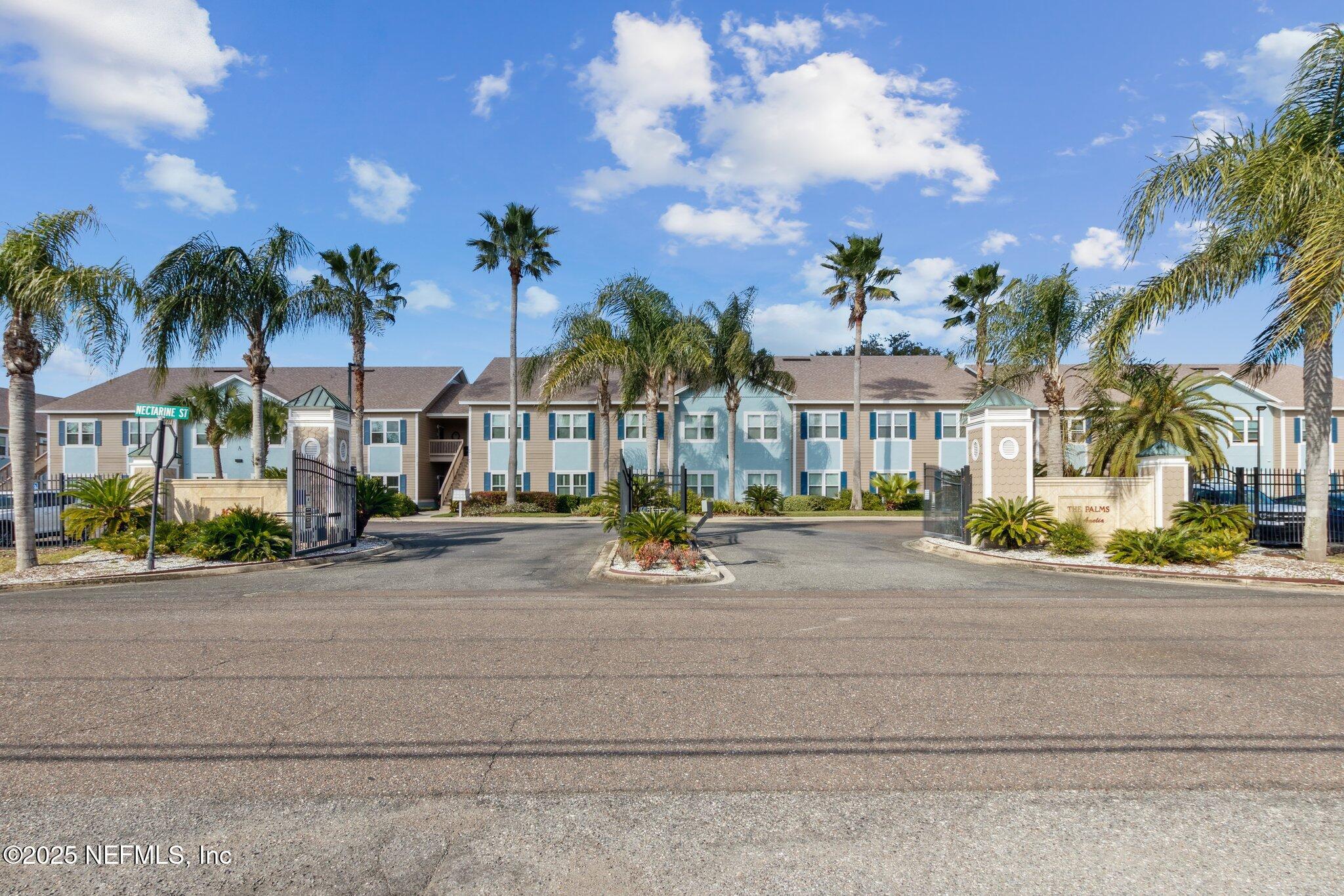 1601 Nectarine Street, Unit F6 Fernandina Beach, FL 32034 - Photo 52 of 57 a view of multiple houses with a street