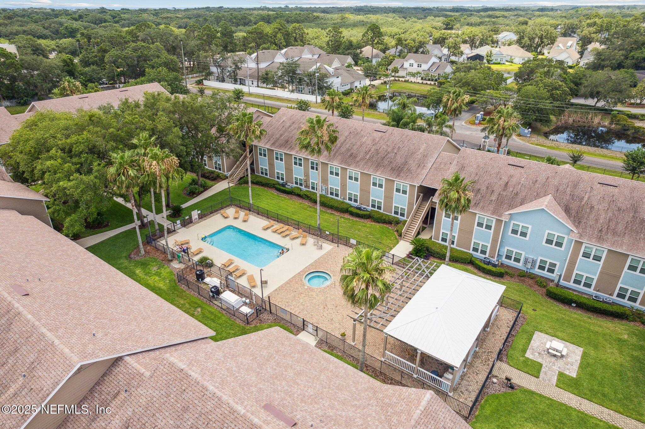 1601 Nectarine Street, Unit F6 Fernandina Beach, FL 32034 - Photo 56 of 57 an aerial view of a house with a swimming pool