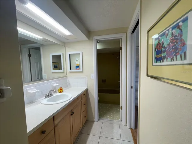 a view of a hallway with closet area