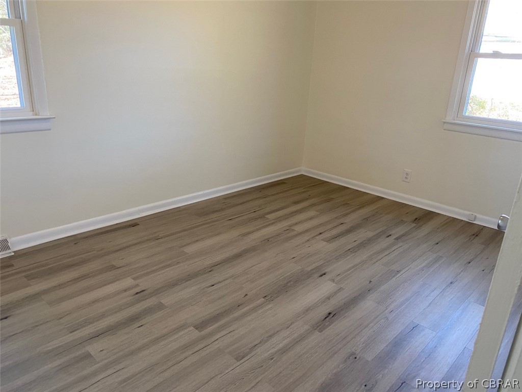 6892 Williams Landing Road Hayes, VA 23072 - Photo 14 of 25 NEW VINYL-PLANK FLOORING THROUGHOUT