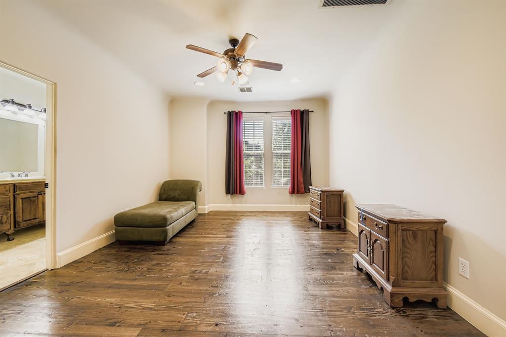 2600 Piazza Court, Unit 5 Grand Prairie, TX 75054 - Photo 14 of 30 a living room with furniture and a chandelier