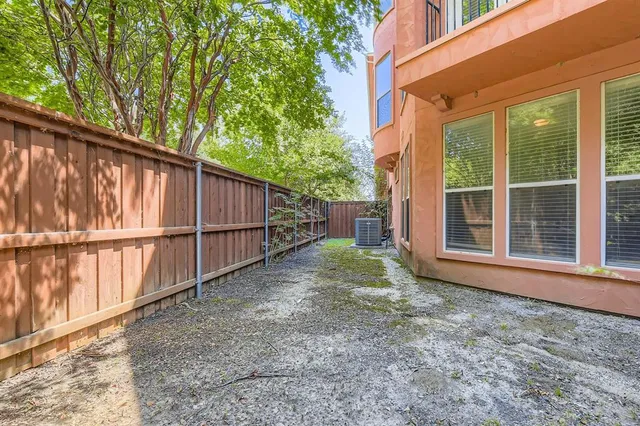 a view of backyard with green space