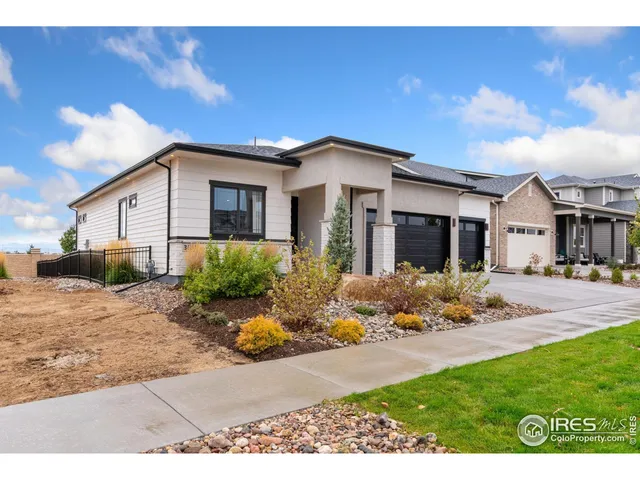 a front view of a house with dining space