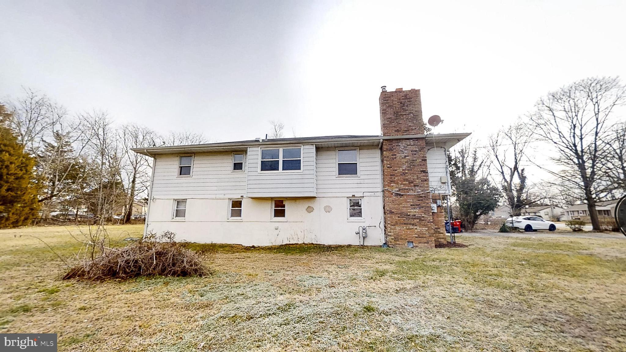 653 Buckshutem Road Bridgeton, NJ 08302 - Photo 27 of 29 a front view of a house with a yard