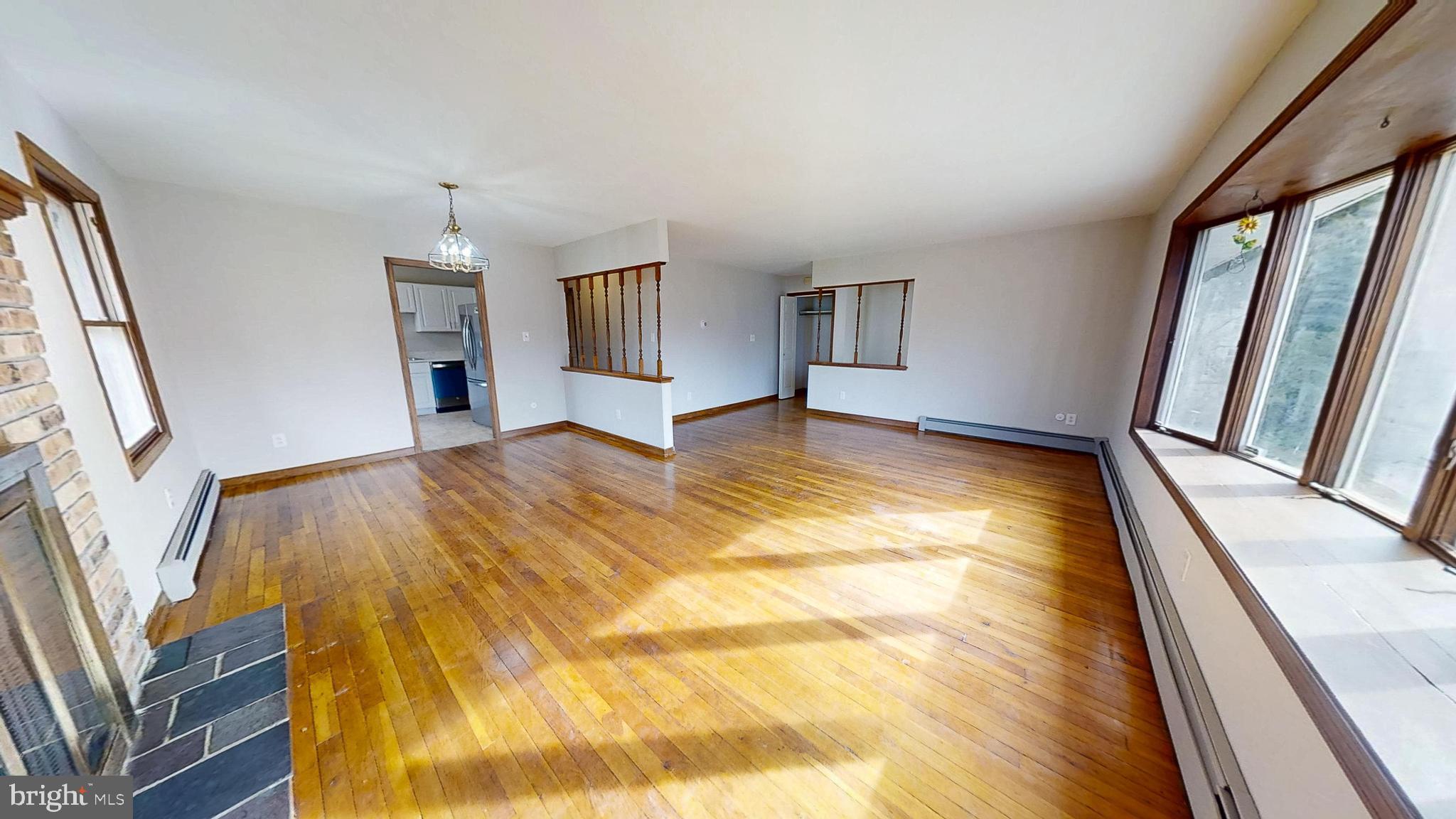 653 Buckshutem Road Bridgeton, NJ 08302 - Photo 7 of 29 a view of an empty room and window