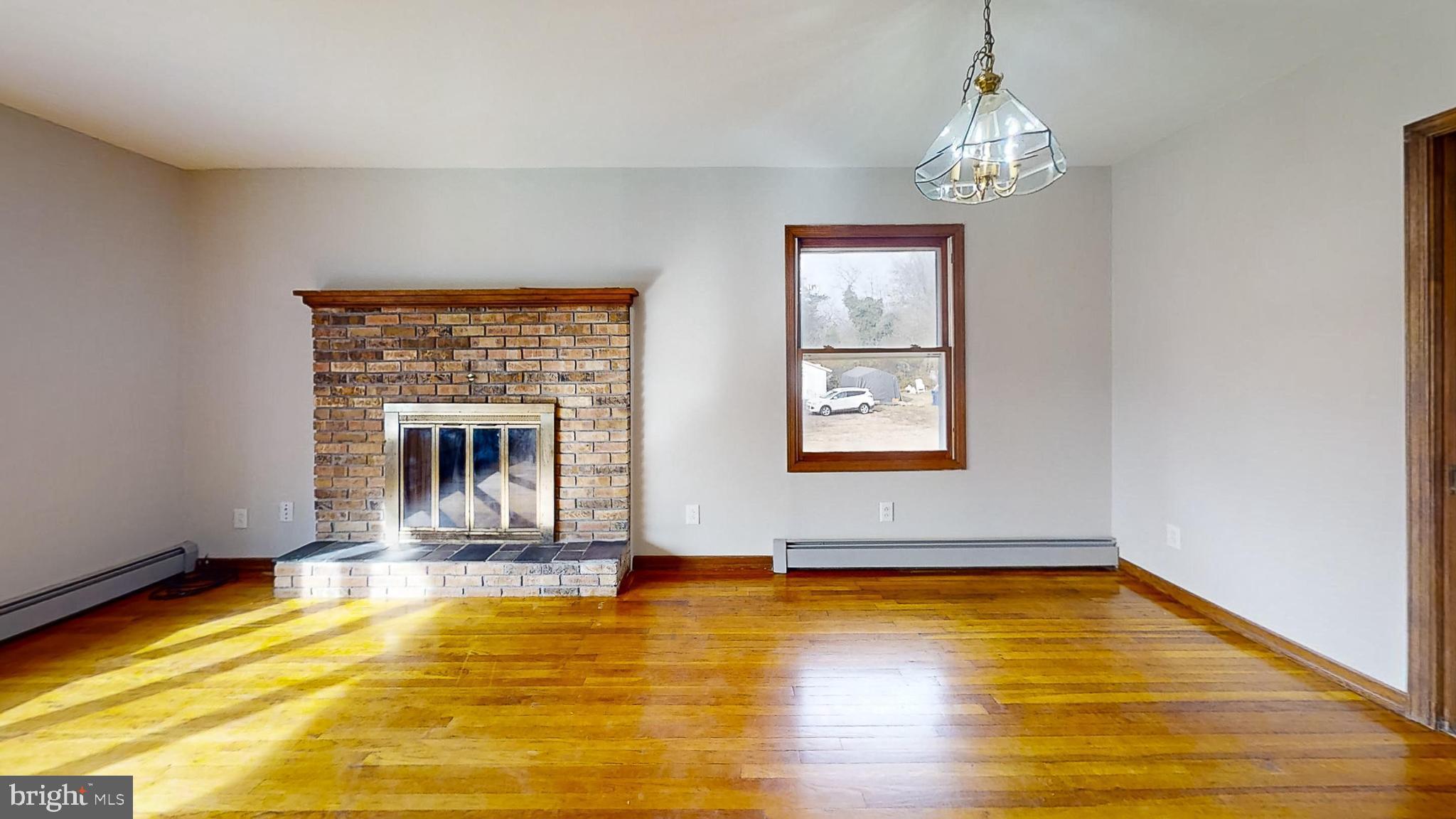 653 Buckshutem Road Bridgeton, NJ 08302 - Photo 8 of 29 a view of empty room with window