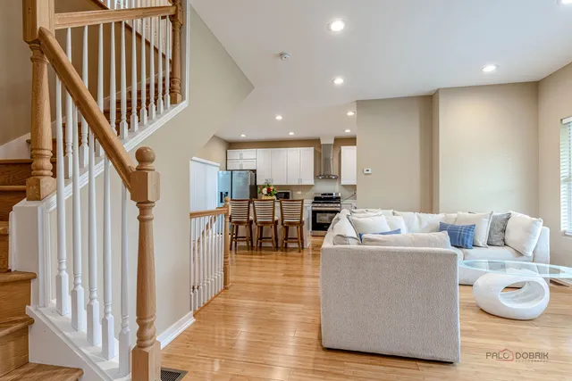a living room with furniture and a table