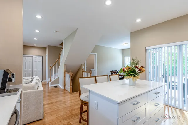 a room with furniture and a wooden floor