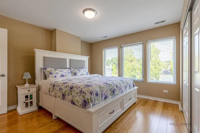 a bed room with a bed and a tv